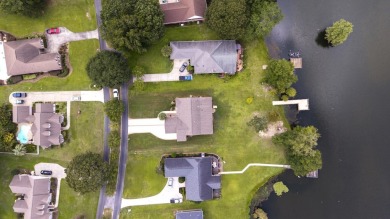Lake Marion Home with a private dock and fantastic features! on Players Course At Wyboo Plantation in South Carolina - for sale on GolfHomes.com, golf home, golf lot