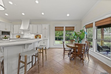 This beautifully updated spacious 4 bedroom, 3 bath home really on University Club in Louisiana - for sale on GolfHomes.com, golf home, golf lot