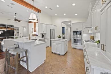 This beautifully updated spacious 4 bedroom, 3 bath home really on University Club in Louisiana - for sale on GolfHomes.com, golf home, golf lot