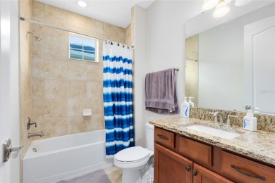This beautifully maintained Jones Homes residence in the gated on Eagle Creek Golf Club in Florida - for sale on GolfHomes.com, golf home, golf lot