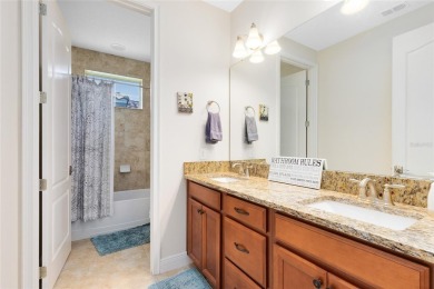 This beautifully maintained Jones Homes residence in the gated on Eagle Creek Golf Club in Florida - for sale on GolfHomes.com, golf home, golf lot