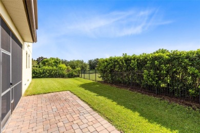 This beautifully maintained Jones Homes residence in the gated on Eagle Creek Golf Club in Florida - for sale on GolfHomes.com, golf home, golf lot