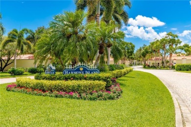 Fabulous Harmony Island and rarely available 3/3 with 2 covered on Oak Harbor Country Club in Florida - for sale on GolfHomes.com, golf home, golf lot
