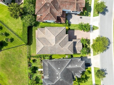 This beautifully maintained Jones Homes residence in the gated on Eagle Creek Golf Club in Florida - for sale on GolfHomes.com, golf home, golf lot