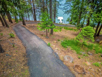 This stunning custom-built home not only offers incredible views on Lake Almanor Country Club in California - for sale on GolfHomes.com, golf home, golf lot