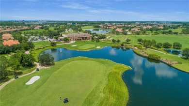 This beautifully maintained Jones Homes residence in the gated on Eagle Creek Golf Club in Florida - for sale on GolfHomes.com, golf home, golf lot