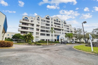 Discover this beautifully updated 2-bedroom, 2-bathroom condo on Feather Sound Country Club in Florida - for sale on GolfHomes.com, golf home, golf lot