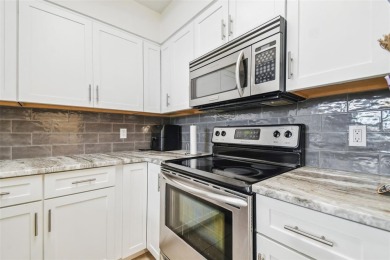 Discover this beautifully updated 2-bedroom, 2-bathroom condo on Feather Sound Country Club in Florida - for sale on GolfHomes.com, golf home, golf lot