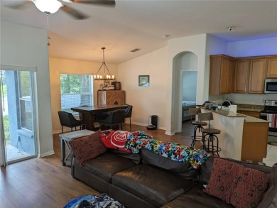 AS IS. A turn-key and versatile 4-bedroom house. New roof on Meadow Oaks Golf and Country Club in Florida - for sale on GolfHomes.com, golf home, golf lot