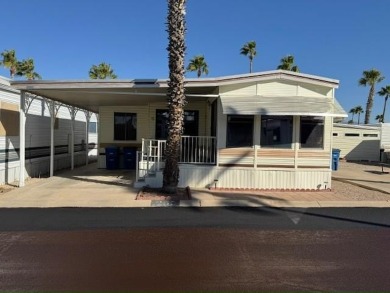 This 1989 Castle Park Model Home is in a beautiful 55+ age on Voyager RV Resort and Golf Course in Arizona - for sale on GolfHomes.com, golf home, golf lot