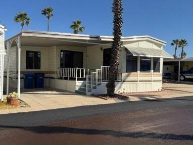 This 1989 Castle Park Model Home is in a beautiful 55+ age on Voyager RV Resort and Golf Course in Arizona - for sale on GolfHomes.com, golf home, golf lot