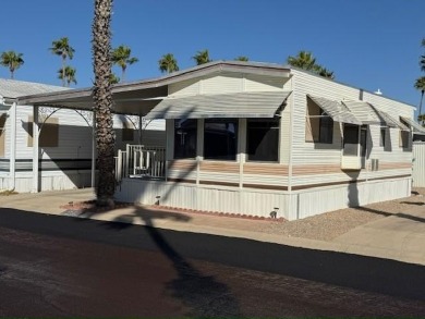 This 1989 Castle Park Model Home is in a beautiful 55+ age on Voyager RV Resort and Golf Course in Arizona - for sale on GolfHomes.com, golf home, golf lot