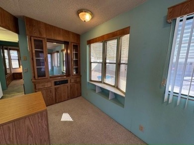 This 1989 Castle Park Model Home is in a beautiful 55+ age on Voyager RV Resort and Golf Course in Arizona - for sale on GolfHomes.com, golf home, golf lot