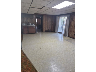 Take a look at this charming 3 bedroom 2 bath home in Terre Du on Terre Du Lac Golf and Country Club in Missouri - for sale on GolfHomes.com, golf home, golf lot