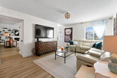 This beautifully updated two-story home is full of charm and on Eastpointe Country Club in Florida - for sale on GolfHomes.com, golf home, golf lot