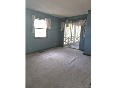 Take a look at this charming 3 bedroom 2 bath home in Terre Du on Terre Du Lac Golf and Country Club in Missouri - for sale on GolfHomes.com, golf home, golf lot