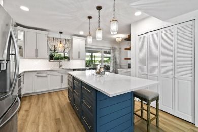 This beautifully updated two-story home is full of charm and on Eastpointe Country Club in Florida - for sale on GolfHomes.com, golf home, golf lot