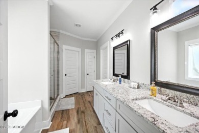 Welcome to this beautifully designed 5-bedroom, 4-bath home in on Canongate At Healy Point Country Club in Georgia - for sale on GolfHomes.com, golf home, golf lot