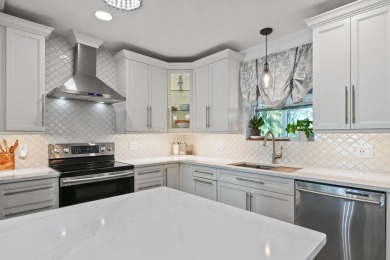 This beautifully updated two-story home is full of charm and on Eastpointe Country Club in Florida - for sale on GolfHomes.com, golf home, golf lot