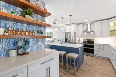 This beautifully updated two-story home is full of charm and on Eastpointe Country Club in Florida - for sale on GolfHomes.com, golf home, golf lot