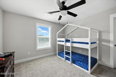 Welcome to this beautifully designed 5-bedroom, 4-bath home in on Canongate At Healy Point Country Club in Georgia - for sale on GolfHomes.com, golf home, golf lot