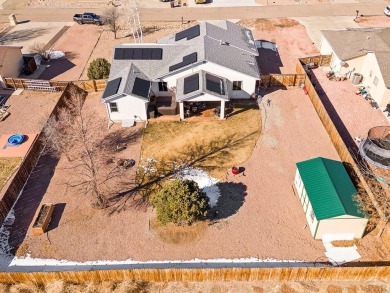 Beautifully landscaped home in the golf course area of Pueblo on Desert Hawk At Pueblo West in Colorado - for sale on GolfHomes.com, golf home, golf lot