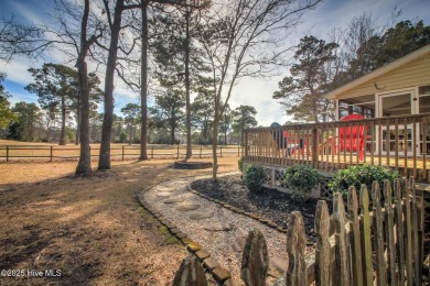 Welcome to this stunning home in the highly sought-after on Brandywine Bay Golf Club in North Carolina - for sale on GolfHomes.com, golf home, golf lot