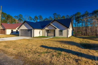 Waterfront, new construction on Lake Sam Rayburn! The soothing on Rayburn Country Club in Texas - for sale on GolfHomes.com, golf home, golf lot