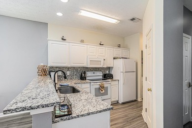 Beautifully updated 2 bed, 2 bath condo in the desirable River on River Oaks Golf Plantation  in South Carolina - for sale on GolfHomes.com, golf home, golf lot