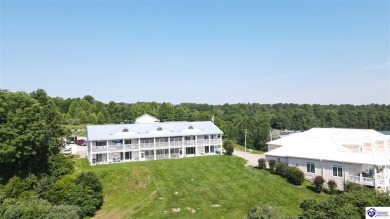 Welcome to your slice of lake life in the heart of Doe Valley! on Doe Valley Country Club in Kentucky - for sale on GolfHomes.com, golf home, golf lot