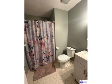 Enjoy resort-style living with beautiful views of the Doe Valley on Doe Valley Country Club in Kentucky - for sale on GolfHomes.com, golf home, golf lot