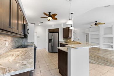 Welcome to your private oasis in the highly sought-after gated on Calusa Lakes Golf Club in Florida - for sale on GolfHomes.com, golf home, golf lot