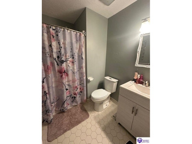 Enjoy resort-style living with beautiful views of the Doe Valley on Doe Valley Country Club in Kentucky - for sale on GolfHomes.com, golf home, golf lot