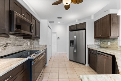 Welcome to your private oasis in the highly sought-after gated on Calusa Lakes Golf Club in Florida - for sale on GolfHomes.com, golf home, golf lot