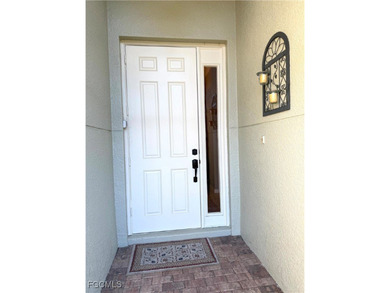 THIS LOVELY HOME IS A MUST SEE TO BELIEVE! This Lovely Home has on Gateway Golf and Country Club in Florida - for sale on GolfHomes.com, golf home, golf lot