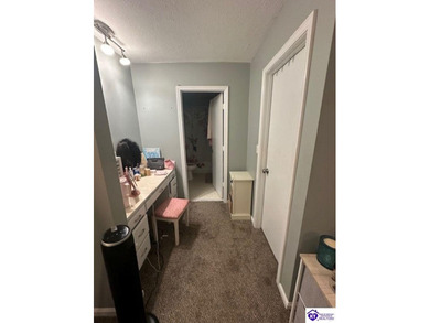 Enjoy resort-style living with beautiful views of the Doe Valley on Doe Valley Country Club in Kentucky - for sale on GolfHomes.com, golf home, golf lot