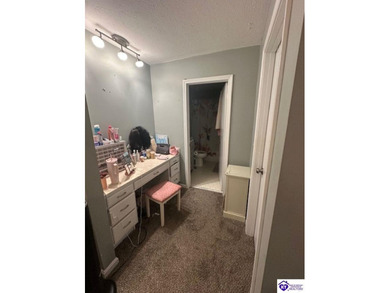 Enjoy resort-style living with beautiful views of the Doe Valley on Doe Valley Country Club in Kentucky - for sale on GolfHomes.com, golf home, golf lot