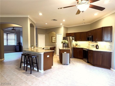 THIS LOVELY HOME IS A MUST SEE TO BELIEVE! This Lovely Home has on Gateway Golf and Country Club in Florida - for sale on GolfHomes.com, golf home, golf lot