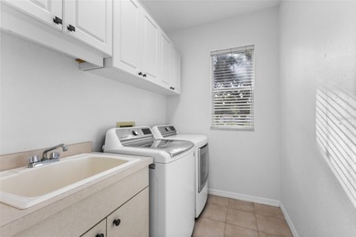 Welcome to your private oasis in the highly sought-after gated on Calusa Lakes Golf Club in Florida - for sale on GolfHomes.com, golf home, golf lot