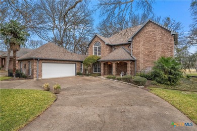 Positioned along the fairways of Mill Creek Golf Course, this on Mill Creek Golf Club in Texas - for sale on GolfHomes.com, golf home, golf lot
