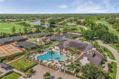 Indulge in breathtaking lake and golf course views from this on Fiddlesticks Country Club in Florida - for sale on GolfHomes.com, golf home, golf lot