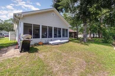 Experience the tranquility of this peaceful abode, situated at on Heron Point Golf Club in South Carolina - for sale on GolfHomes.com, golf home, golf lot