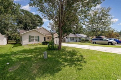 Experience the tranquility of this peaceful abode, situated at on Heron Point Golf Club in South Carolina - for sale on GolfHomes.com, golf home, golf lot