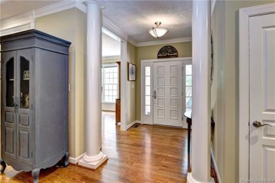 Located at the end of a quiet cul-de-sac on the 10th hole of the on Fords Colony Country Club in Virginia - for sale on GolfHomes.com, golf home, golf lot