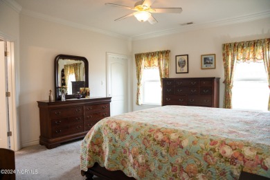 This stunning 3-bedroom, bonus room, and 3-bath residence boasts on The Carolina Club in North Carolina - for sale on GolfHomes.com, golf home, golf lot