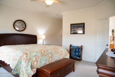 This stunning 3-bedroom, bonus room, and 3-bath residence boasts on The Carolina Club in North Carolina - for sale on GolfHomes.com, golf home, golf lot