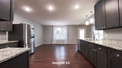 Newer Contemporary Home with a golf course view.  (Hole 14) on West Plains Country Club in Missouri - for sale on GolfHomes.com, golf home, golf lot
