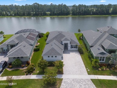 Located in the prestigious Venetian Bay, this custom-designed on Venetian Bay Golf Course in Florida - for sale on GolfHomes.com, golf home, golf lot