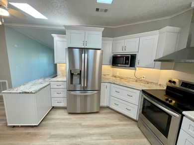 This Water View/Golf Course View Home has been renovated by the on Water Oak Country Club Estates in Florida - for sale on GolfHomes.com, golf home, golf lot