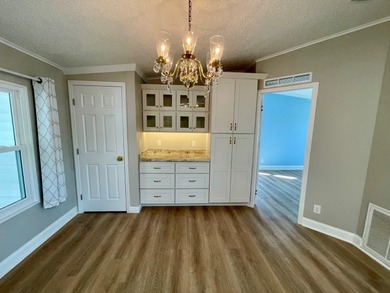 This Water View/Golf Course View Home has been renovated by the on Water Oak Country Club Estates in Florida - for sale on GolfHomes.com, golf home, golf lot